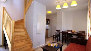 Apartment, 2 Bedrooms | Living area | Flat-screen TV, ping pong