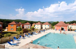 Seasonal outdoor pool, pool loungers