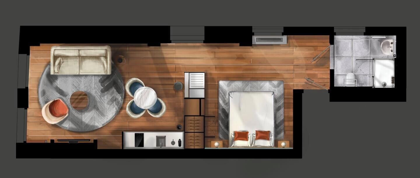 A top-down view of a hotel room with a bed, a small seating area, a bathroom, and a kitchenette.
