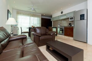 City Condo, 1 Bedroom | Living area - Papaya 20 by CocoBR (Playa del Carmen)