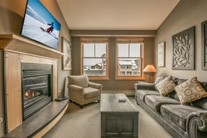 Premier Condo, 1 Bedroom, Resort View (Silver Mill 8311) | Living area | Flat-screen TV, fireplace, DVD player - Silver Mill 8311 (Keystone)