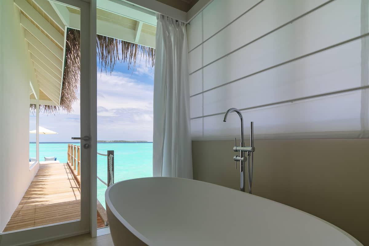 separate bathtub and shower, free toiletries, hair dryer, slippers