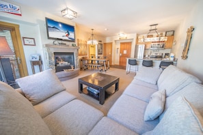 Premium Condo, 1 Bedroom, Balcony, Resort View (Jack Pine 8005) | Living area | 43-inch flat-screen TV with cable channels, TV, fireplace - Jack Pine 8005 (Keystone)