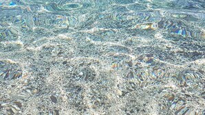 A clear view of a beach with visible sand and water. - Casa di Campagna Dal Pozzo (Sorso)