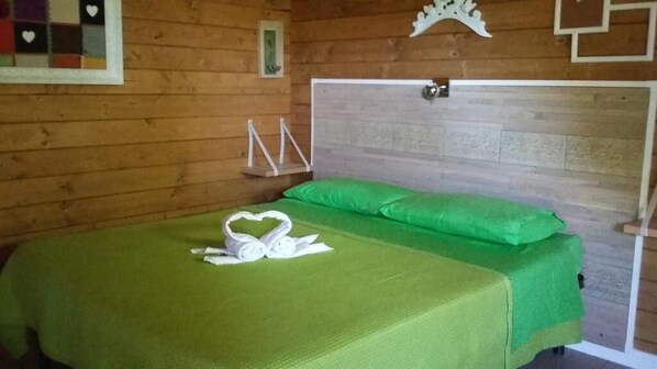 Family Bungalow, Kitchenette, Annex Building | Individually decorated, individually furnished, desk, cots/infant beds