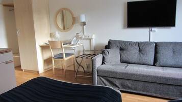 Family Double or Twin Room, 1 Bedroom | In-room safe, desk, laptop workspace, blackout drapes