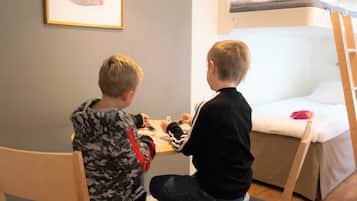 Family Room | 1 bedroom, in-room safe, desk, laptop workspace