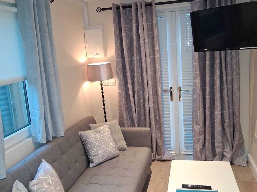 Leilighet | Oppholdsområde | En 32-tommers Flatskjerm-TV med førsteklasses TV-kanaler samt TV