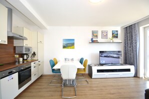 Apartamento | Zona de estar | Una televisión de pantalla plana
