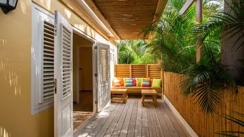 Happy Hummingbird ground floor two bedroom apartment,with garden view terrace and shared plunge pool | Terrace/patio