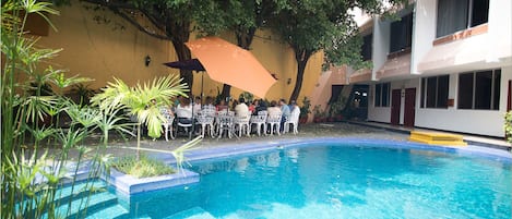 Outdoor pool, sun loungers