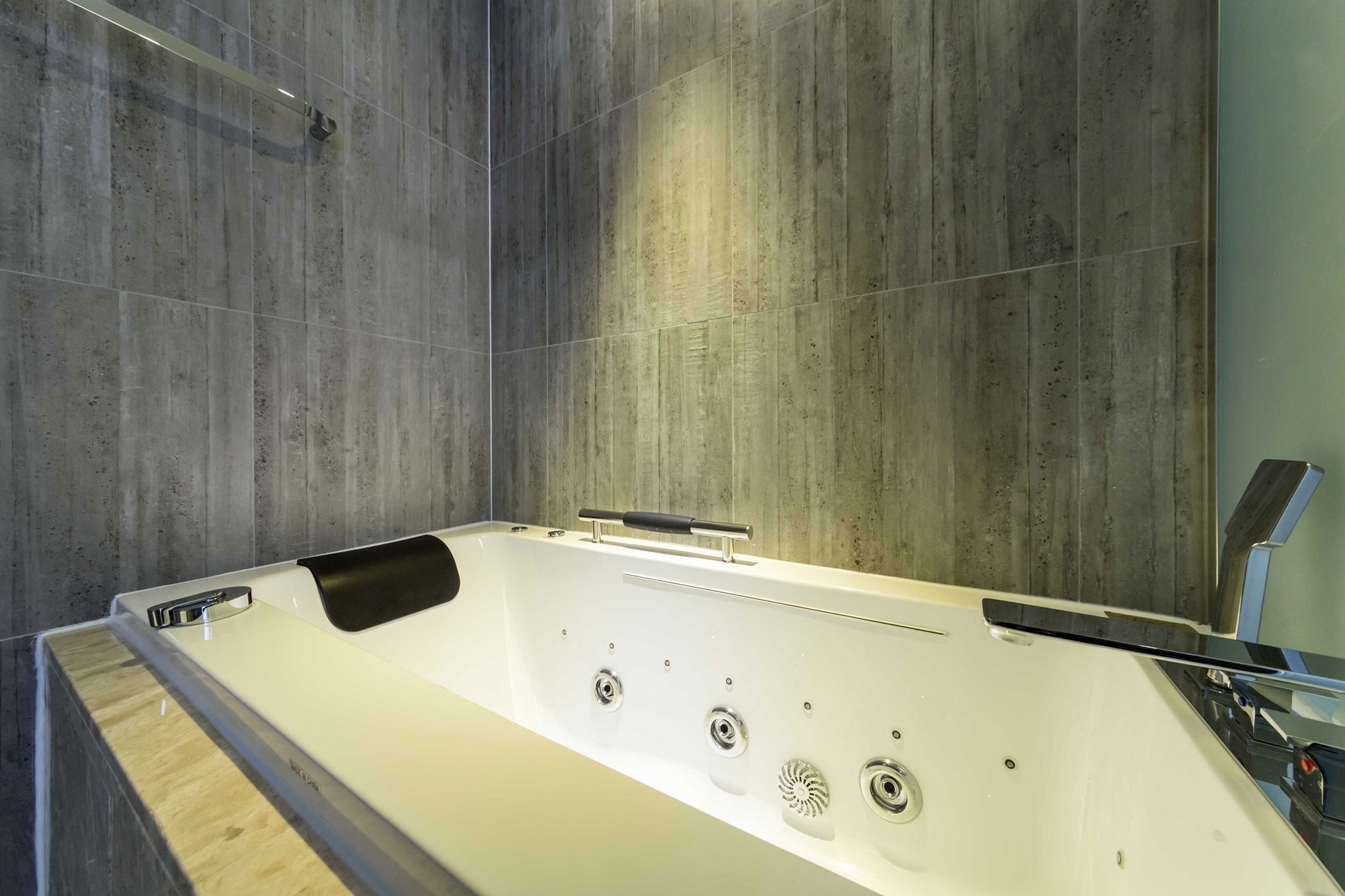 standard twin room | bathroom | bathtub, jetted bath, designer toiletries, hair dryer
