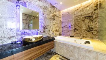 Penthouse | Bathroom | Bathtub, jetted tub, designer toiletries, hair dryer