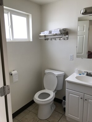 Standard Room | Bathroom | Free toiletries, hair dryer, towels