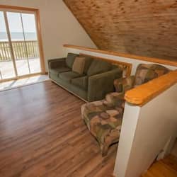 89 – Oceanfront 3 Story Cottage | Living room | TV