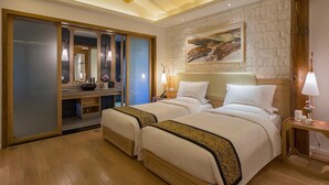 A hotel room with two beds, a wooden ceiling, a stone wall, and a large painting. - Ivy Garden Hotels & Resorts - Lijiang Henghehao (Lijiang)
