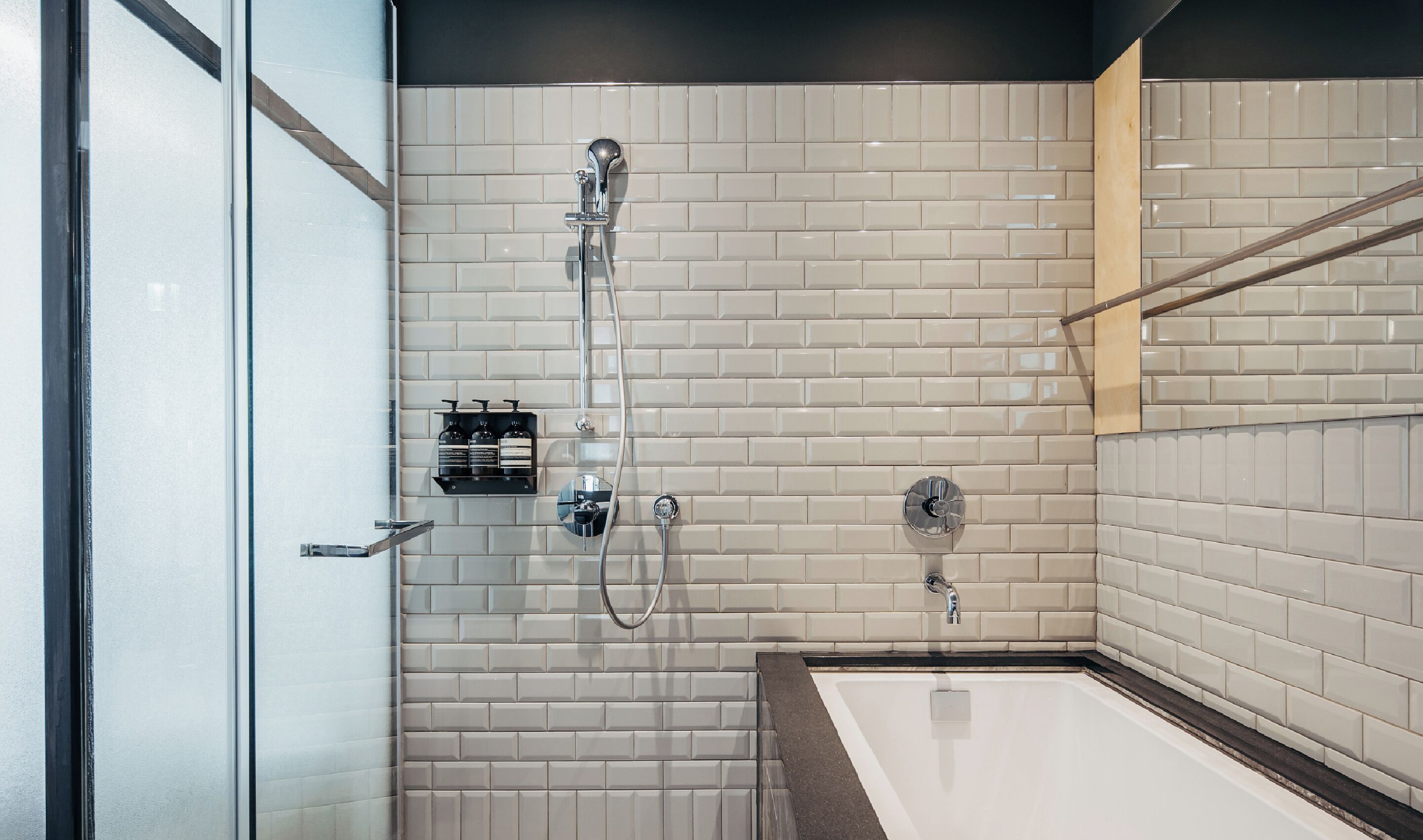 deluxe room | bathroom | hair dryer, slippers, towels