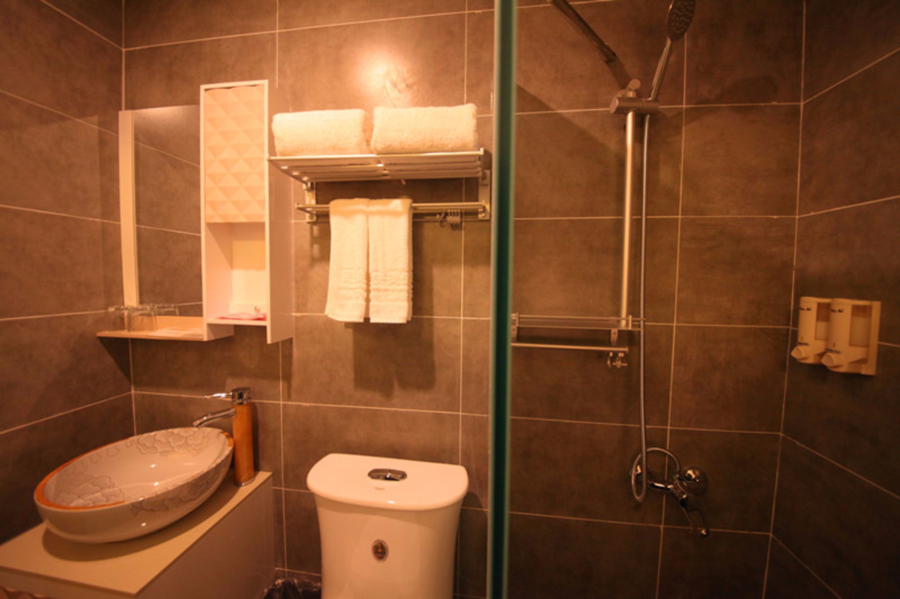superior twin room | bathroom | shower, free toiletries, hair dryer, slippers