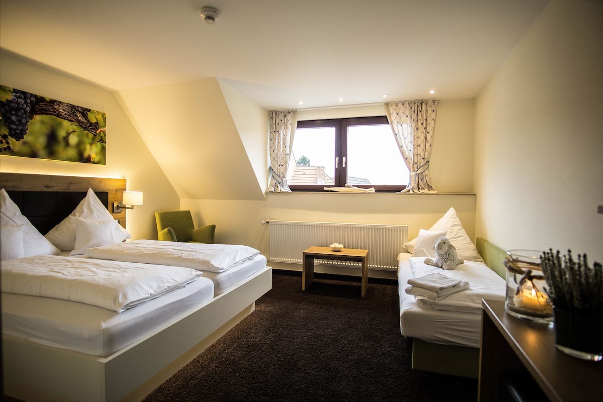 Classic Triple Room, 1 Queen Bed with Sofa bed | In-room safe, desk, rollaway beds, free WiFi