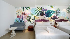 A hotel room with a bed, two bedside tables, a chair, and a small table. - Hotel de Art USJ 21 (Subang Jaya)