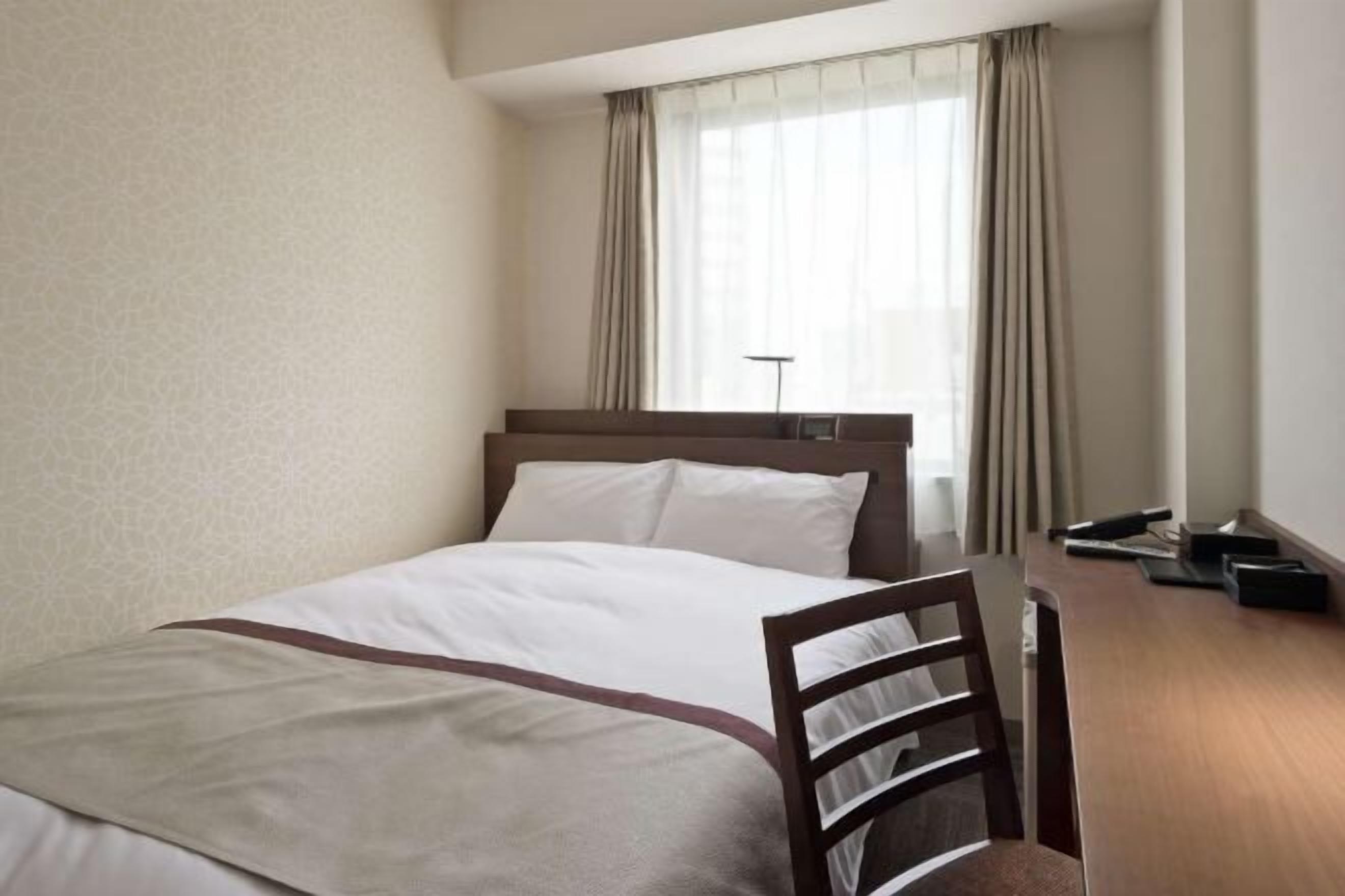 Down comforters, desk, laptop workspace, blackout drapes