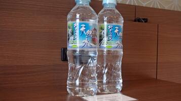 Combined shower/tub, free toiletries, hair dryer, slippers