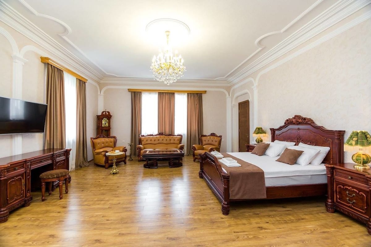 Suite Business, 1 cama de matrimonio grande, vistas a la ciudad | 1 dormitorio, ropa de cama de alta calidad, minibar y caja fuerte