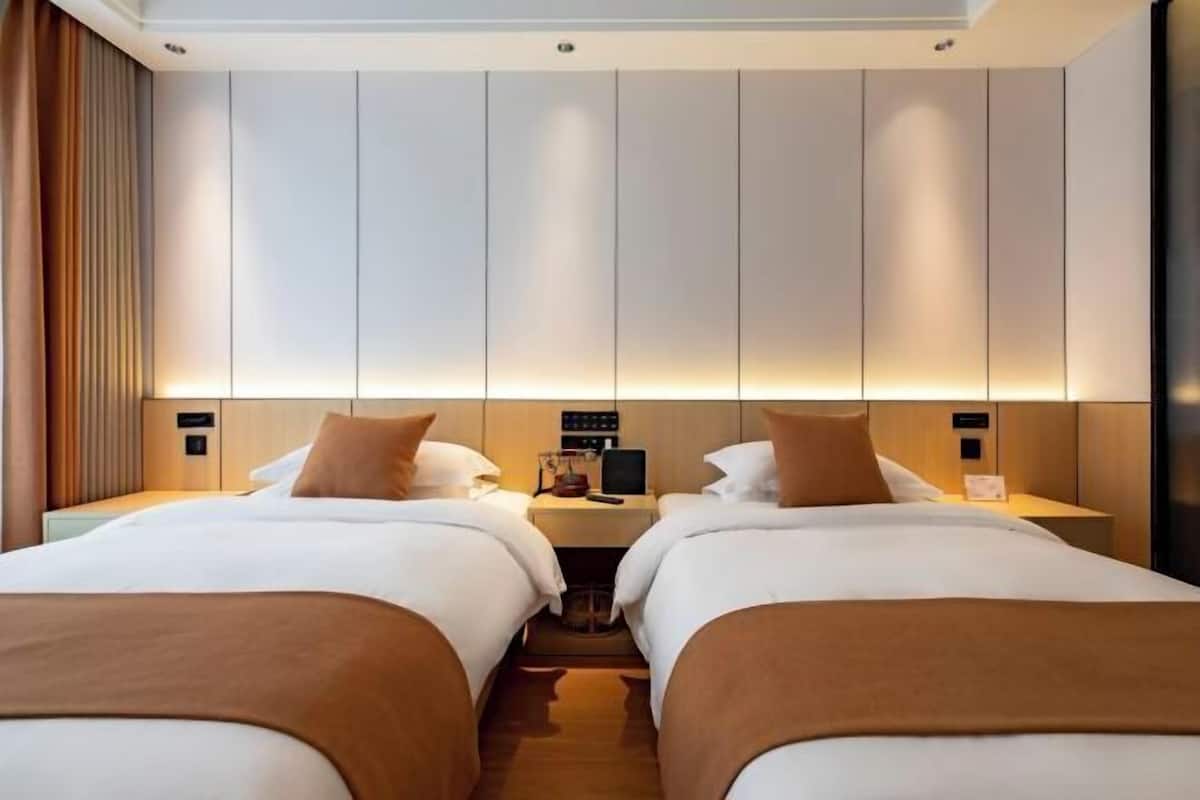 Premium bedding, down duvets, in-room safe, desk