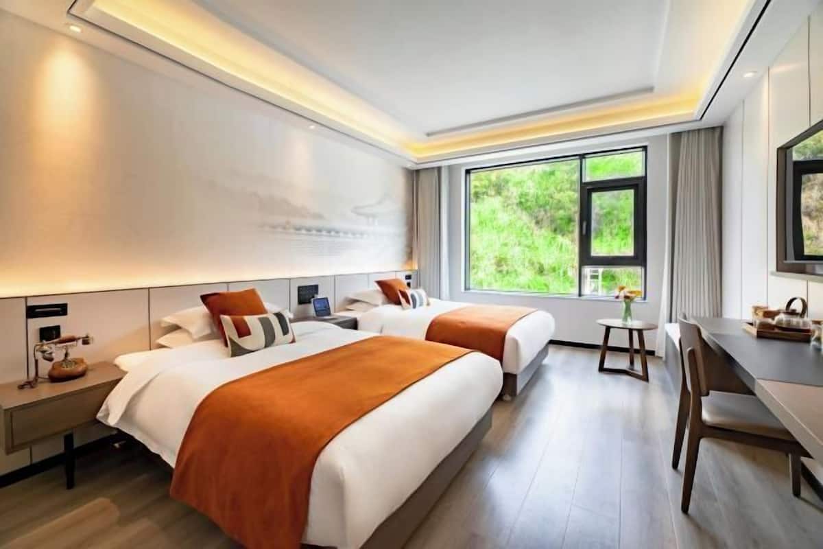 Premium bedding, down duvets, in-room safe, desk