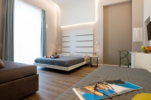 Superior Quadruple Room (Libertà) | Premium bedding, minibar, in-room safe, desk - B&B In Centro Palermo (Palermo)