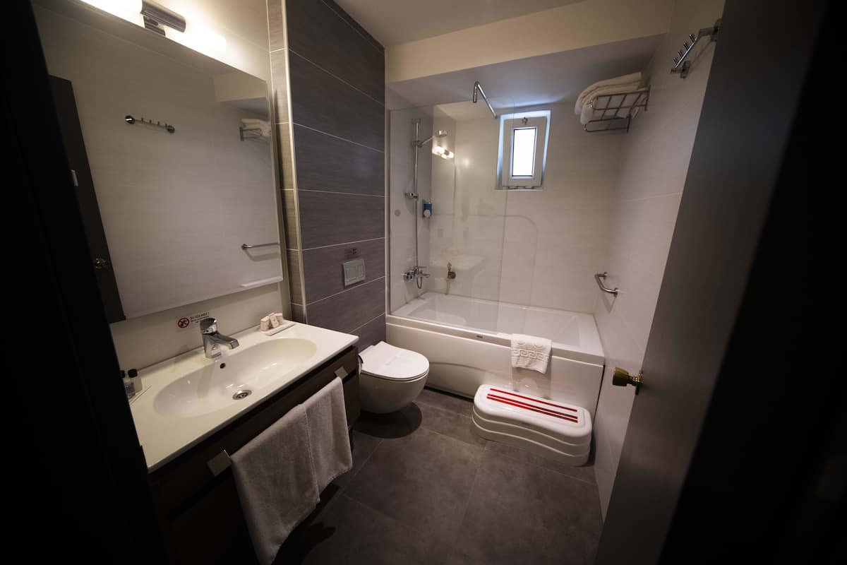 comfort triple room | bathroom | bathtub, spring water bathtub, free toiletries, hair dryer