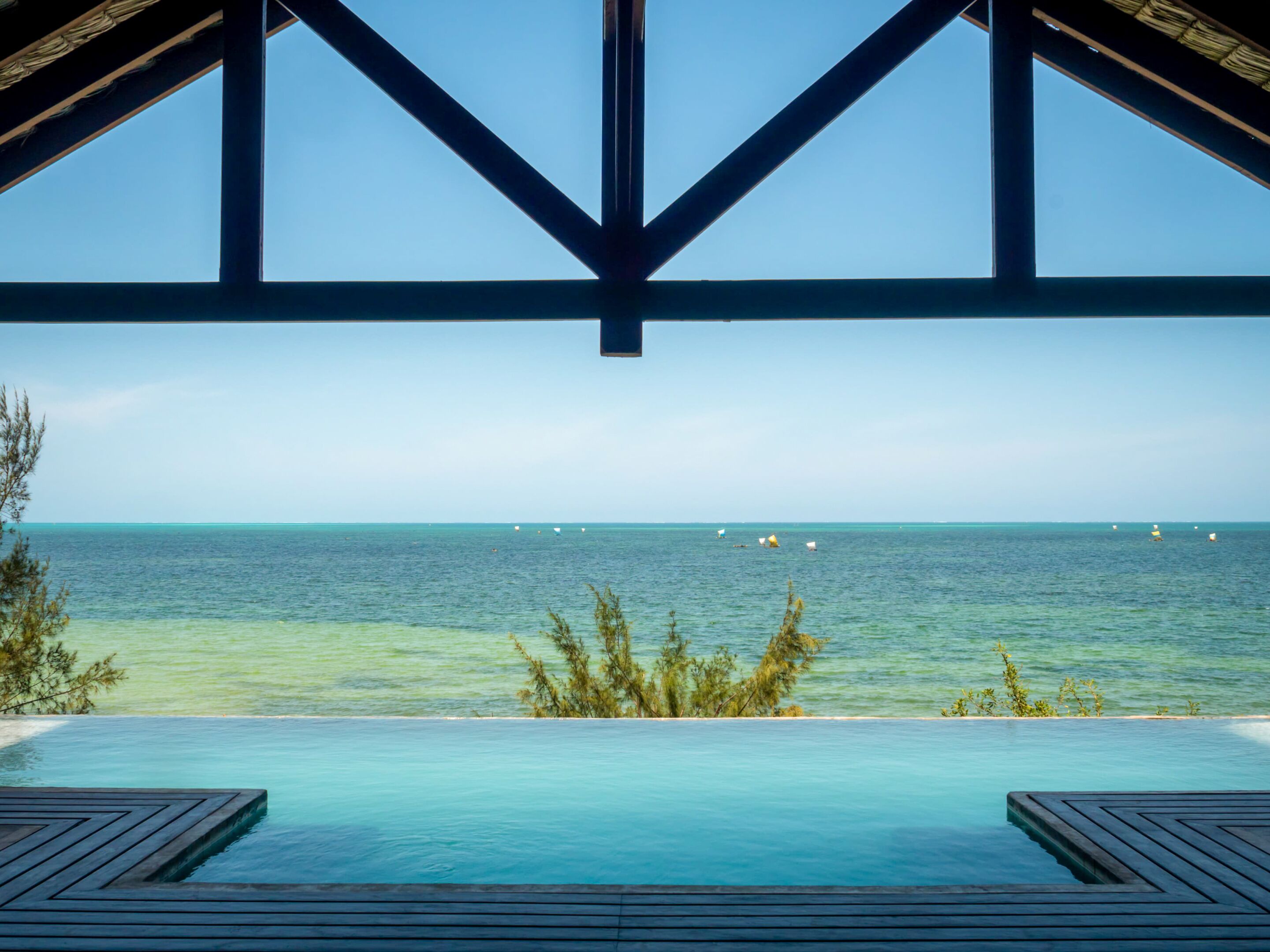 Outdoor pool, an infinity pool, pool loungers