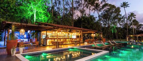 Outdoor pool, open 9:00 AM to 9:00 PM, pool umbrellas, pool loungers
