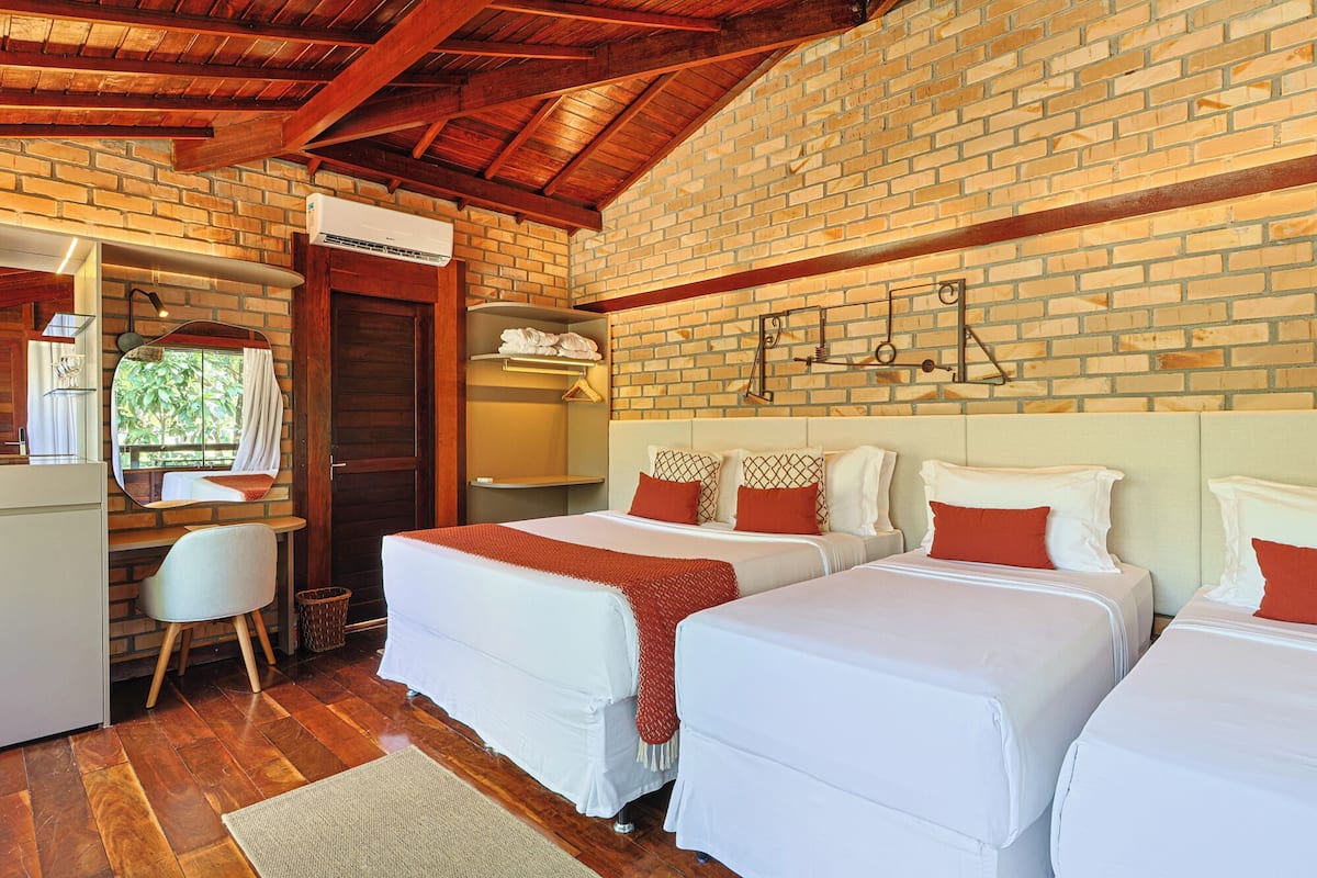 Quadruple Room | Minibar, desk, laptop workspace, blackout drapes