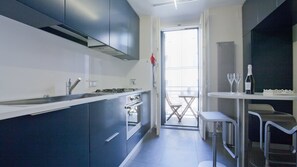 Apartment, 2 Bedrooms, Balcony | Private kitchen | Fridge, microwave, oven, stovetop