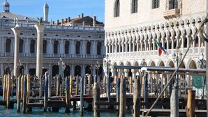A historic building with arched windows and a patterned facade, likely a landmark in Venice. - B&B Le Marie (Venice)