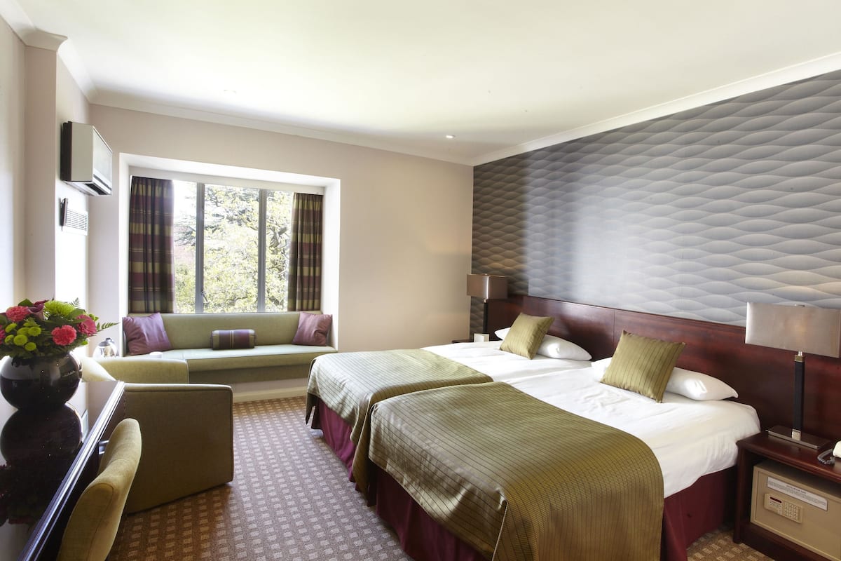 Standaard Twin kamer | Luxe beddengoed, een kluis op de kamer, een bureau, geluiddichte muren