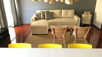 Apartment, 3 Bedrooms | Living area | Flat-screen TV