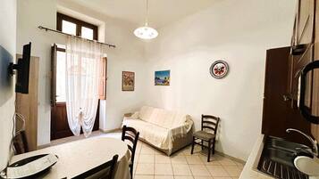 Apartment, Terrace, Partial Sea View | Living area