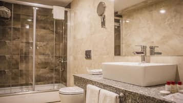 Shower, free toiletries, hair dryer, slippers