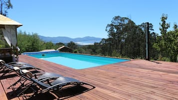 Seasonal outdoor pool, pool umbrellas, sun loungers