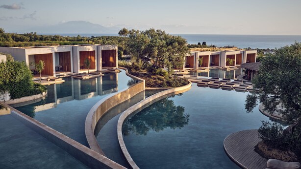 A resort with infinity pools, wooden cabins, and a view of the sea. - Olea All Suite Hotel, a Member of Design Hotels (Zakynthos)