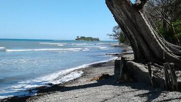 On the beach, sun-loungers, snorkelling, surfing