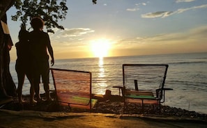 On the beach, sun-loungers, snorkelling, surfing