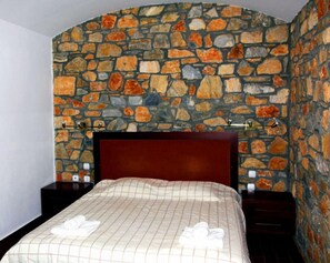 Suite junior, vistas al mar | Tabla de planchar con plancha y wifi gratis
