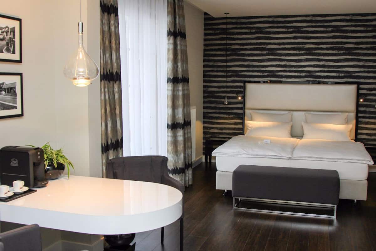 superior suite | premium bedding, in-room safe, desk, soundproofing