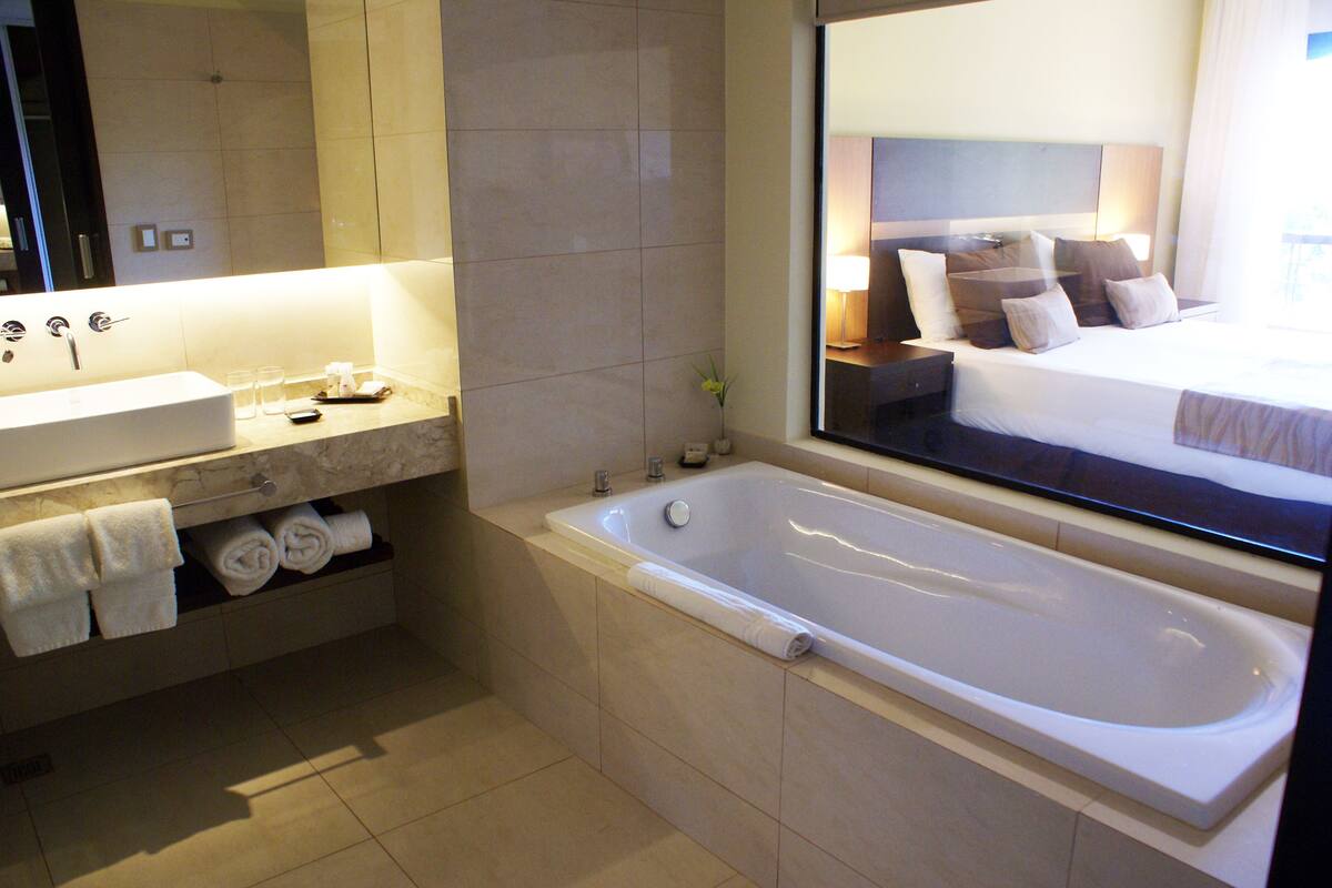 superior double or twin room | bathroom | separate bathtub and shower, deep-soaking bathtub, free toiletries