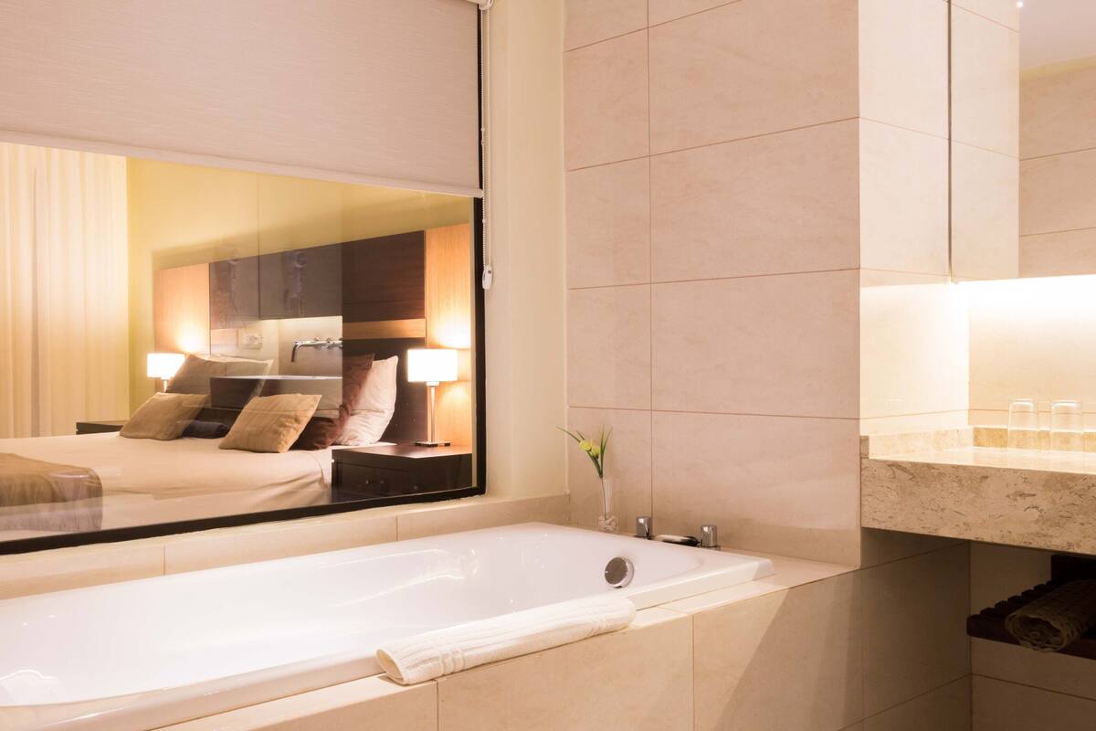 separate bathtub and shower, deep-soaking bathtub, free toiletries