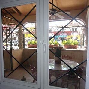 Suite 1, Queen Bed separate kitchen and living room | Terrace/patio