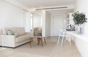 Suite, Balcony, Garden View | Minibar, in-room safe, desk, laptop workspace